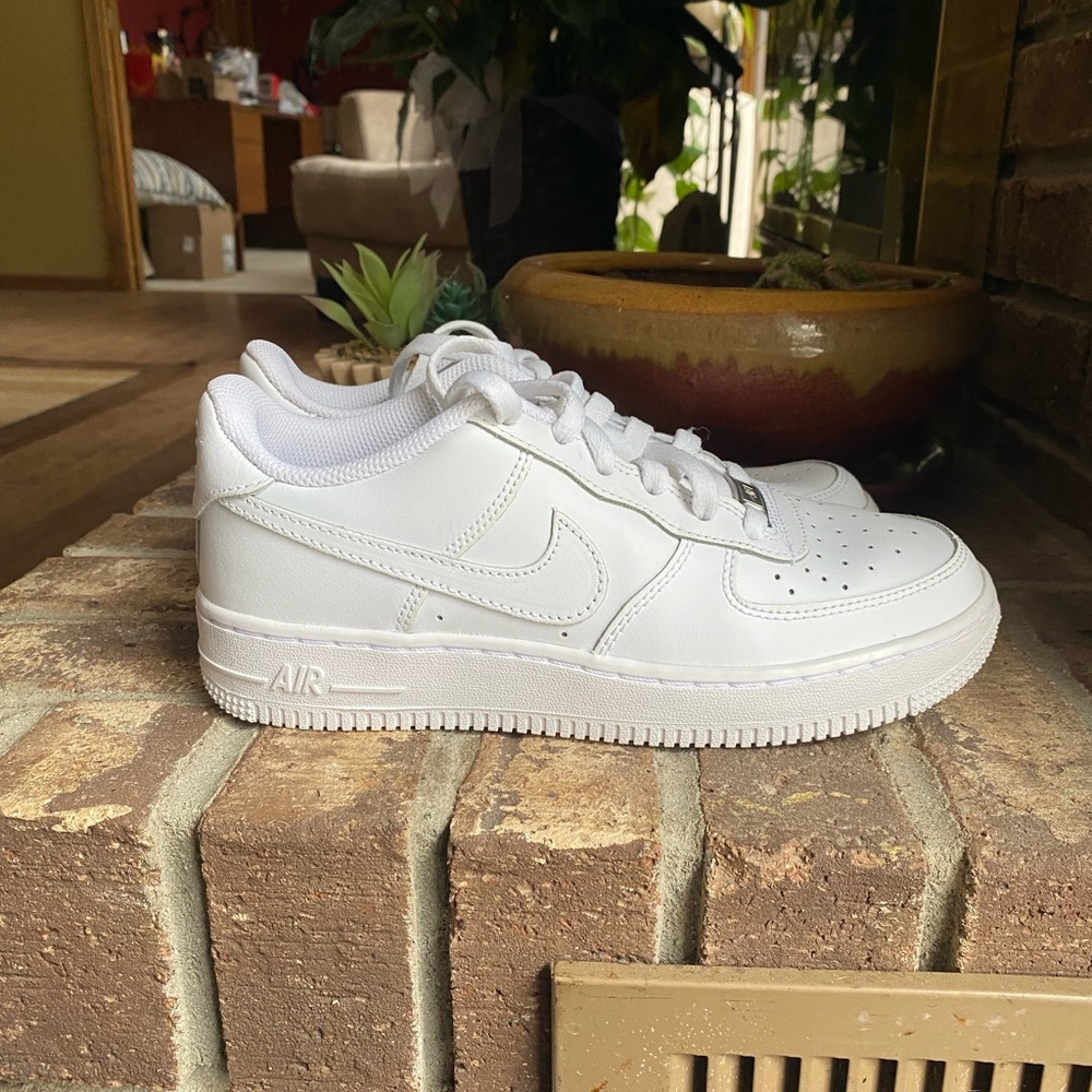 All white Nike Air Force 1’s